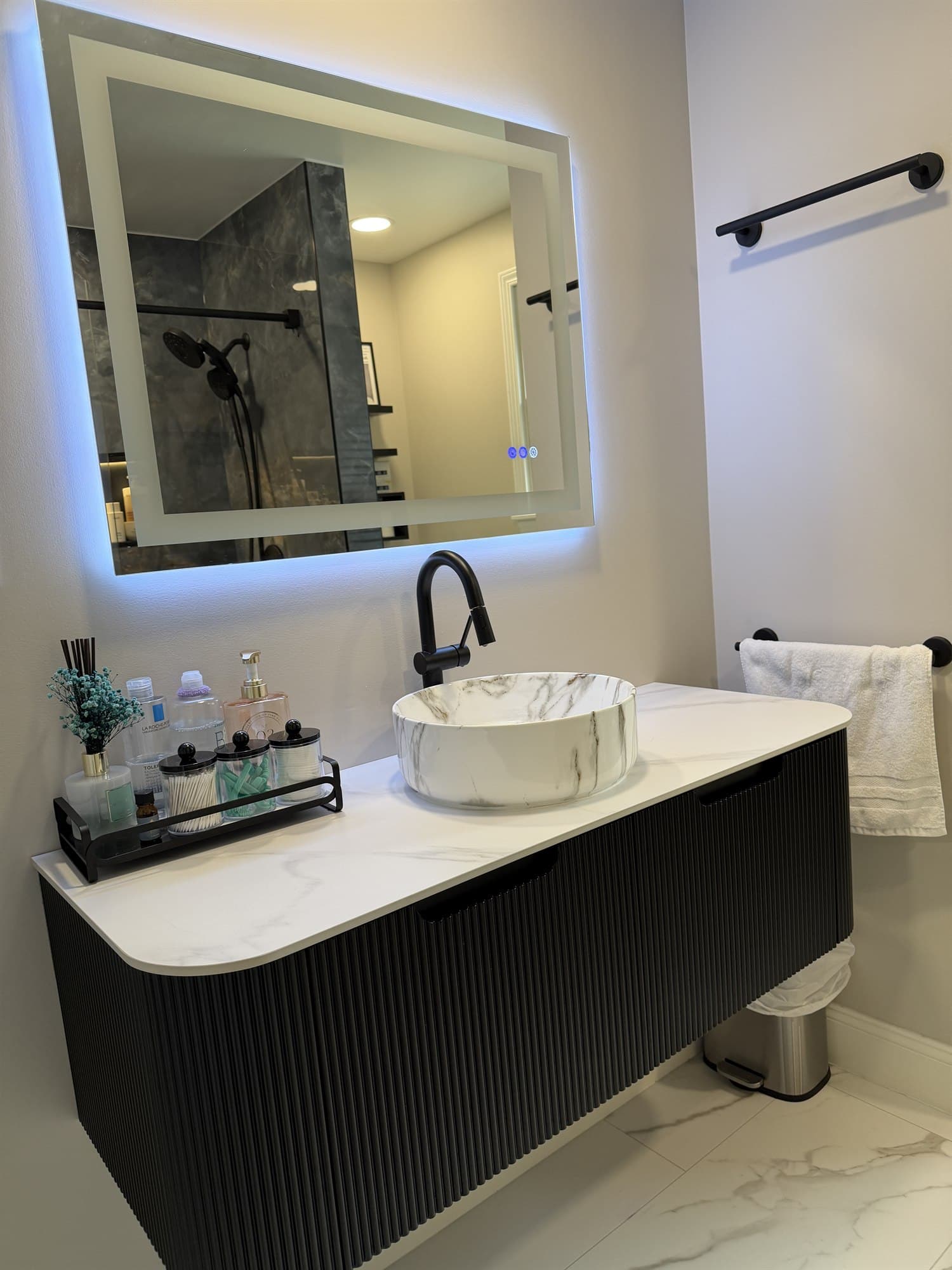 Bathroom vanity with tiled surround in a Benco Remodeling bathroom renovation